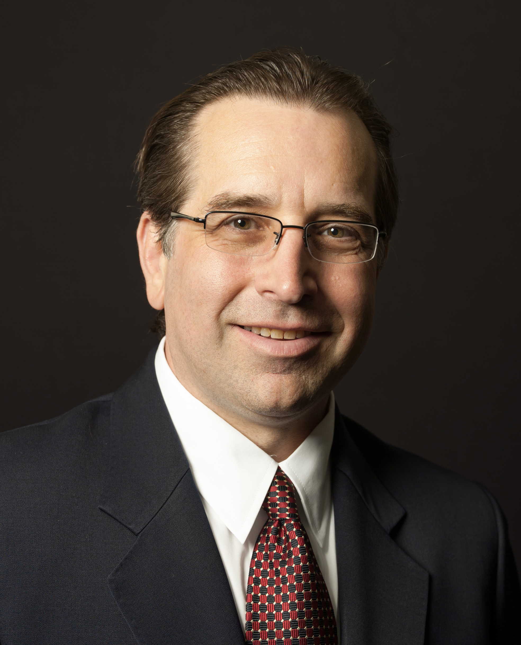 Dr. Glenn J. Wolfinger